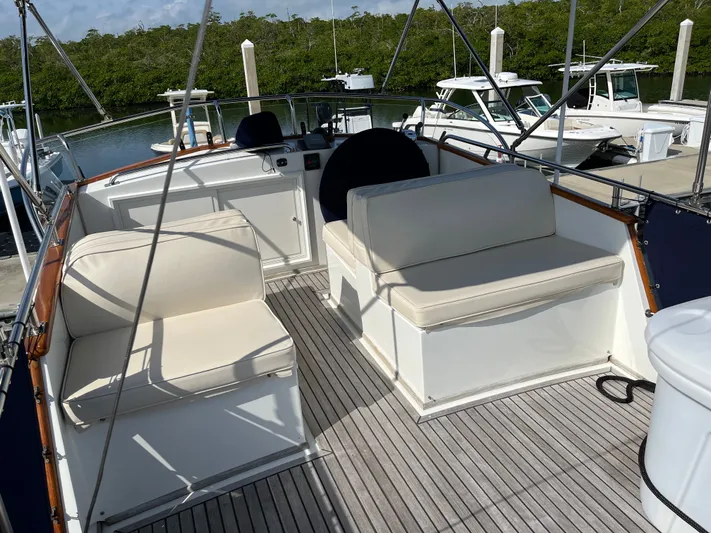  Yacht Photos Pics Interior of a 1990 Grand Banks 32 Trawler with seating area.
