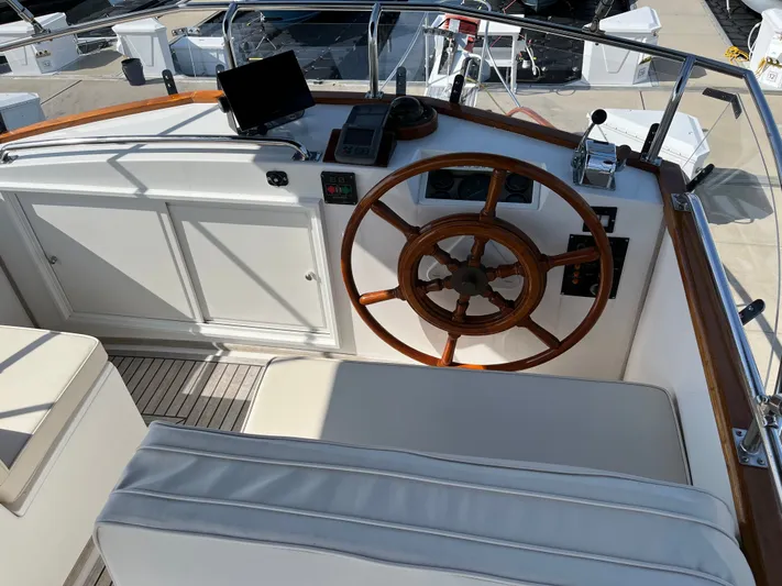  Yacht Photos Pics Helm of a 1990 Grand Banks 32 Trawler.