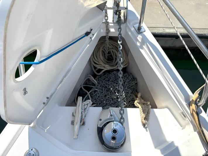 Bylgja Yacht Photos Pics Anchor locker of 2005 Hunter 38 sailboat with ropes and chain.