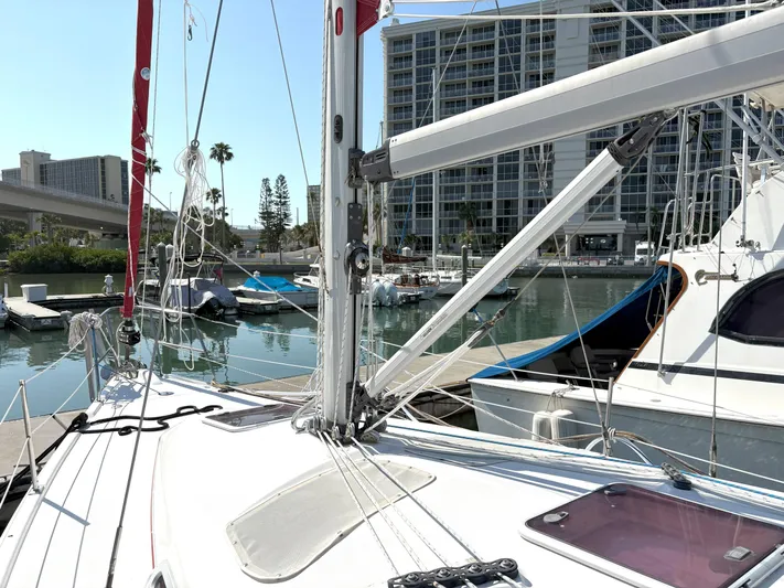 Bylgja Yacht Photos Pics Sailboat docked in marina, Hunter 38 model, 2005, with cityscape background.