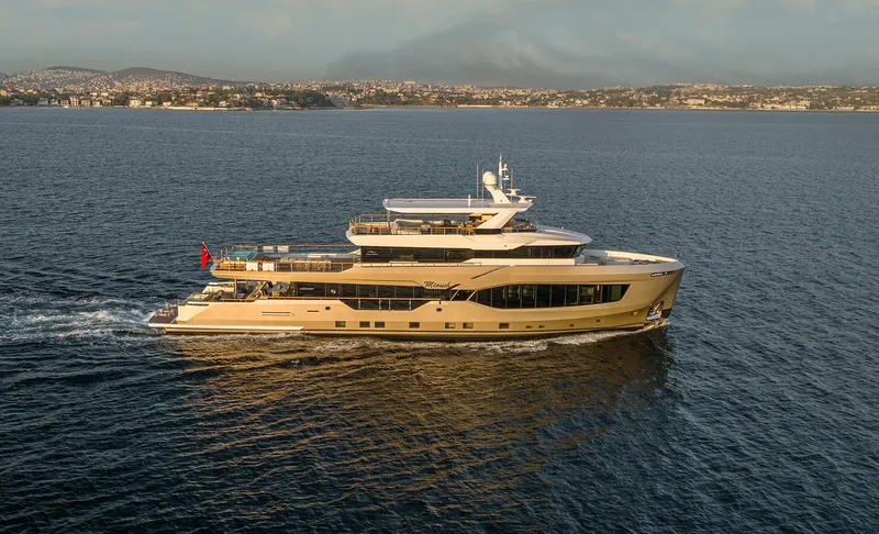 Numarine 40mxp Yacht Photos Pics Luxurious 2026 Numarine 40MXP yacht cruising on open water at sunset.