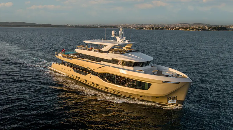 Numarine 40mxp Yacht Photos Pics Luxurious 2026 Numarine 40MXP yacht cruising on open water at sunset.