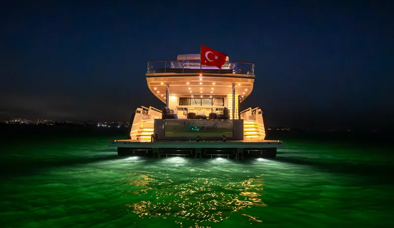 Numarine 40mxp Yacht Photos Pics Luxurious 2026 Numarine 40MXP yacht illuminated at night, featuring Turkish flag and glowing waters.