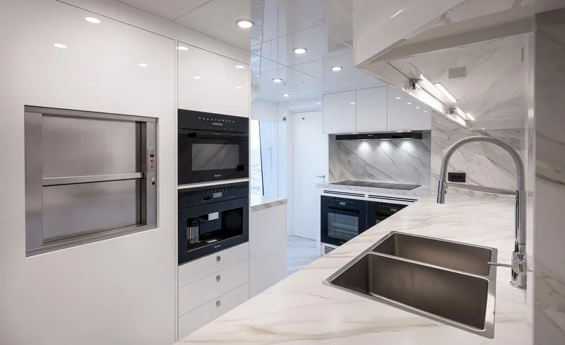 Numarine 40mxp Yacht Photos Pics Luxurious 2026 Numarine 40MXP yacht kitchen with modern appliances and sleek marble countertops.