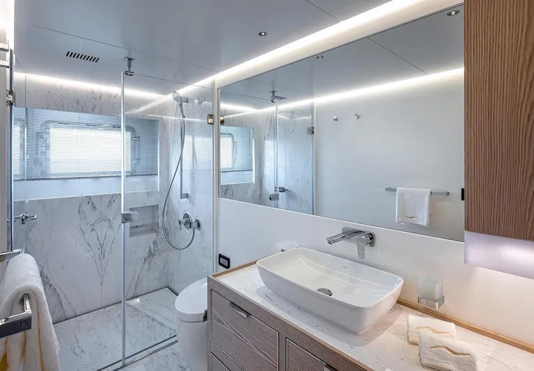 Numarine 40mxp Yacht Photos Pics Luxurious bathroom in 2026 Numarine 40MXP yacht with modern fixtures and marble accents.