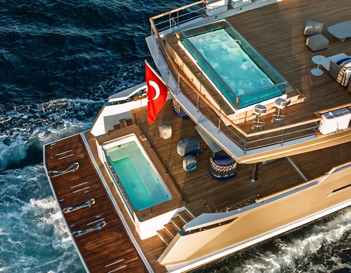 Numarine 40mxp Yacht Photos Pics Luxurious 2026 Numarine 40MXP yacht with pools, cruising on open sea.