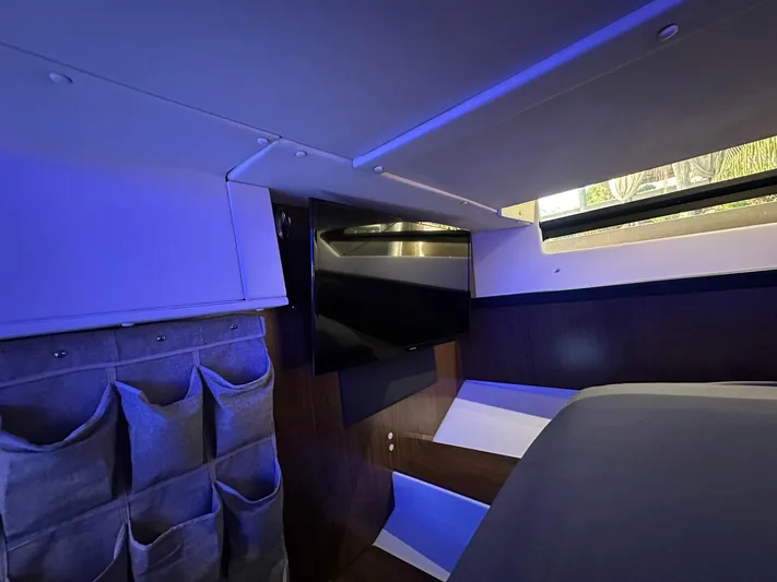 Olivia Yacht Photos Pics Interior of 2020 Four Winns Vista 355 Coupe with modern design and ambient lighting.