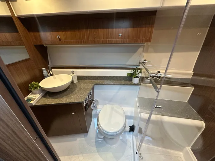 Olivia Yacht Photos Pics Modern bathroom in 2020 Four Winns Vista 355 Coupe yacht with sleek design and amenities.