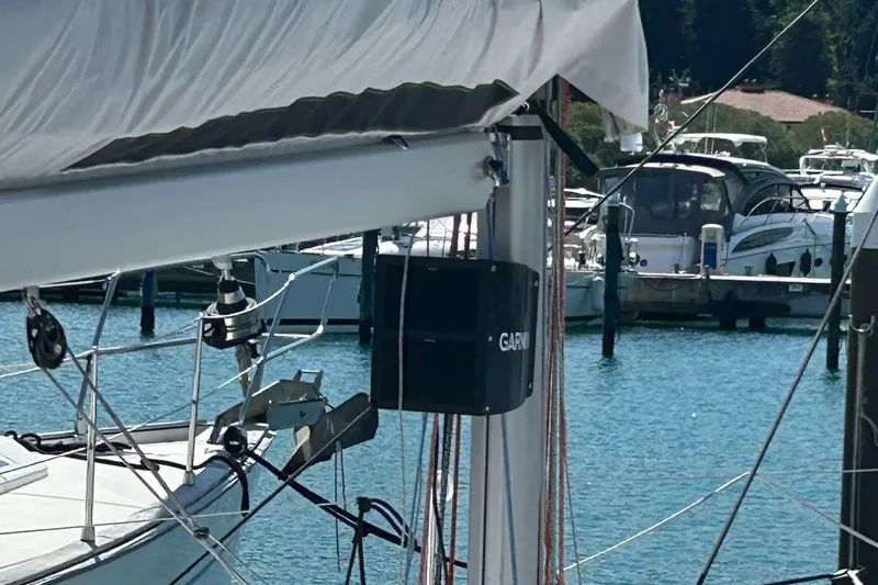 Yacht Photos Pics Beneteau First 30 sailboat mast with Garmin equipment, docked in a marina, 2025 model.