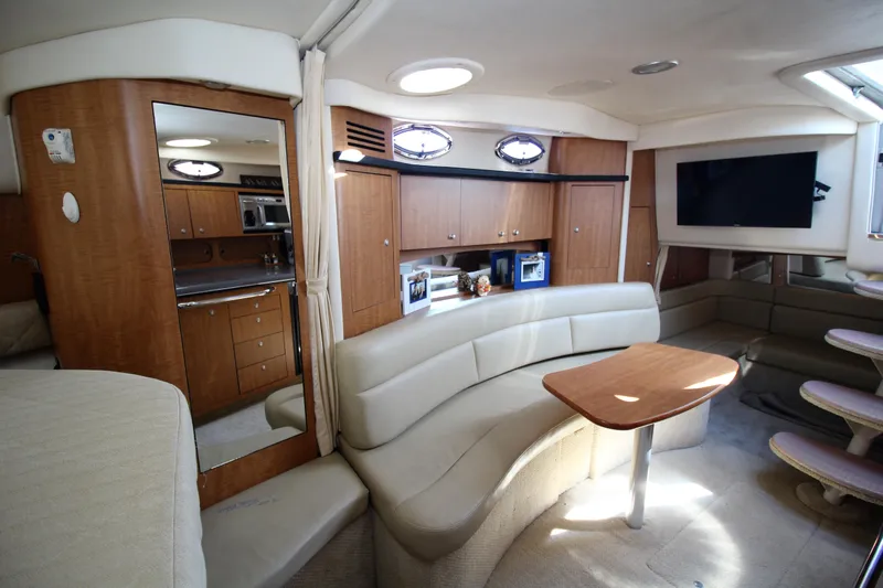  Yacht Photos Pics Interior of 2006 Sea Ray 340 Sundancer yacht with modern seating and entertainment area.