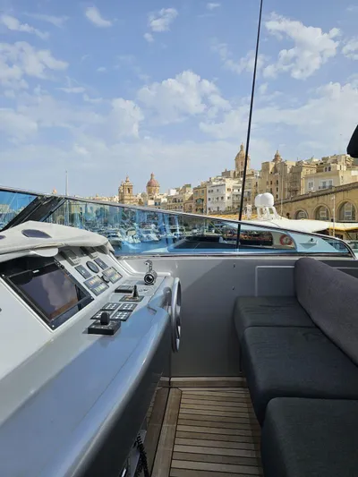 Naughty By Nature Yacht Photos Pics Luxury Rizzardi 105 yacht interior with cityscape view, 2002 model.