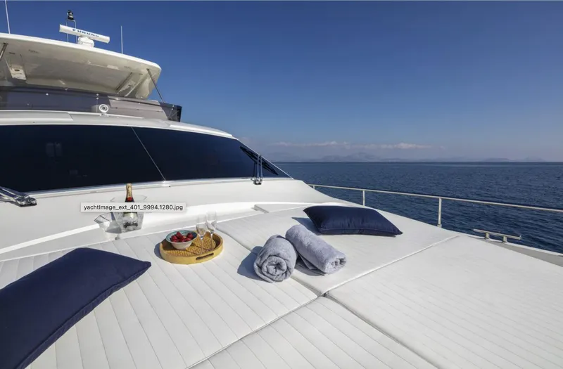 Lidia Yacht Photos Pics Luxurious 2006 Ferretti Yachts 830 with sunbathing deck, cushions, and ocean view.