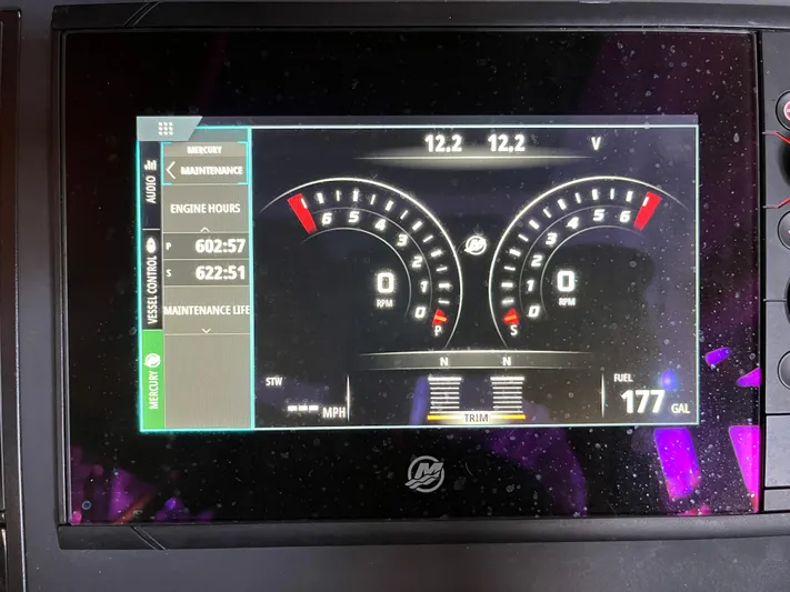  Yacht Photos Pics Dashboard display of a 2019 Axopar 37 Sun Top showing engine hours and fuel level.