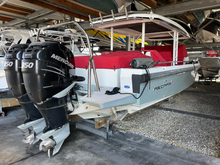  Yacht Photos Pics 2019 Axopar 37 Sun Top with twin Mercury 150 engines in storage.