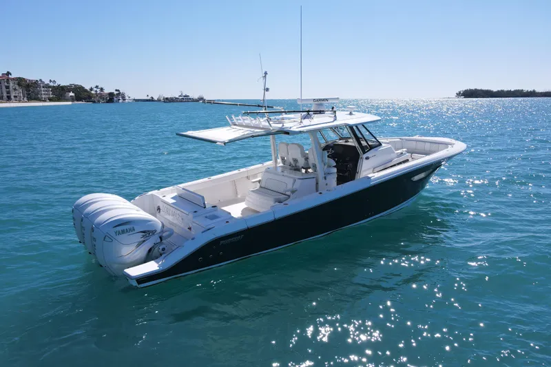  Yacht Photos Pics 2021 Pursuit S 378 Sport boat on clear blue water, featuring Yamaha engines.