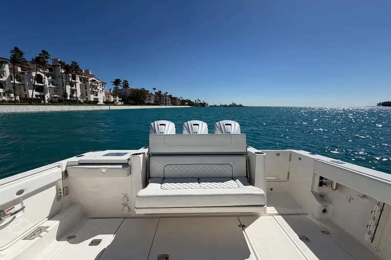  Yacht Photos Pics 2021 Pursuit S 378 Sport boat with ocean view and luxury seating.