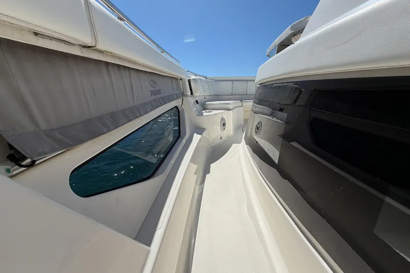  Yacht Photos Pics 2021 Pursuit S 378 Sport boat deck with sleek design and ocean view.