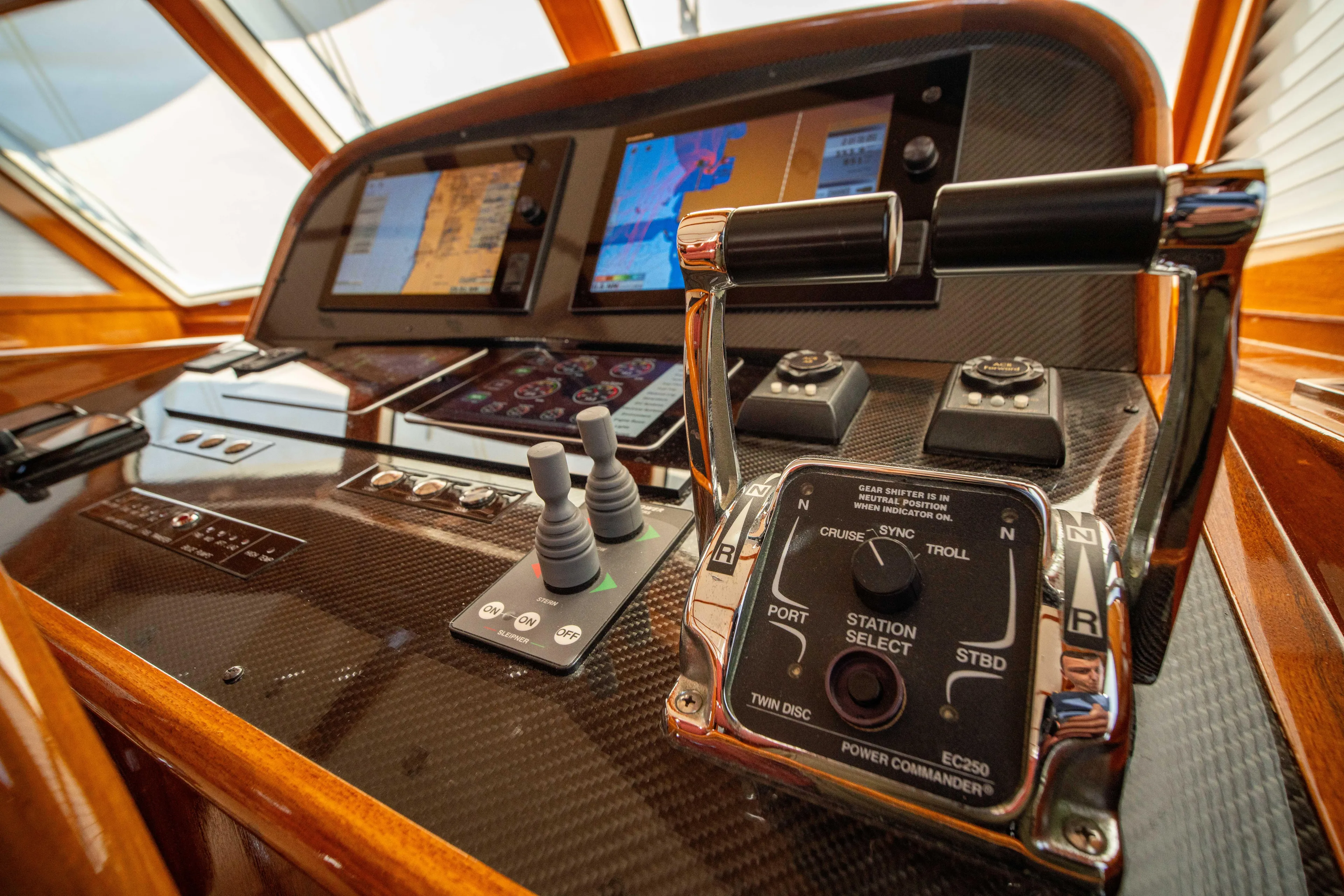Halcyon Yacht Photos Pics Control panel of 2004 Grand Banks 58 Eastbay FB yacht with navigation screens.