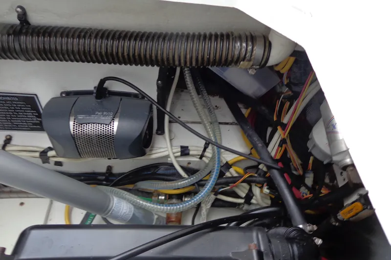 Tugs-n-kisses And Triple Axle Trailer Yacht Photos Pics 2011 Ranger Tugs R-29 Classic engine compartment with wiring and components.