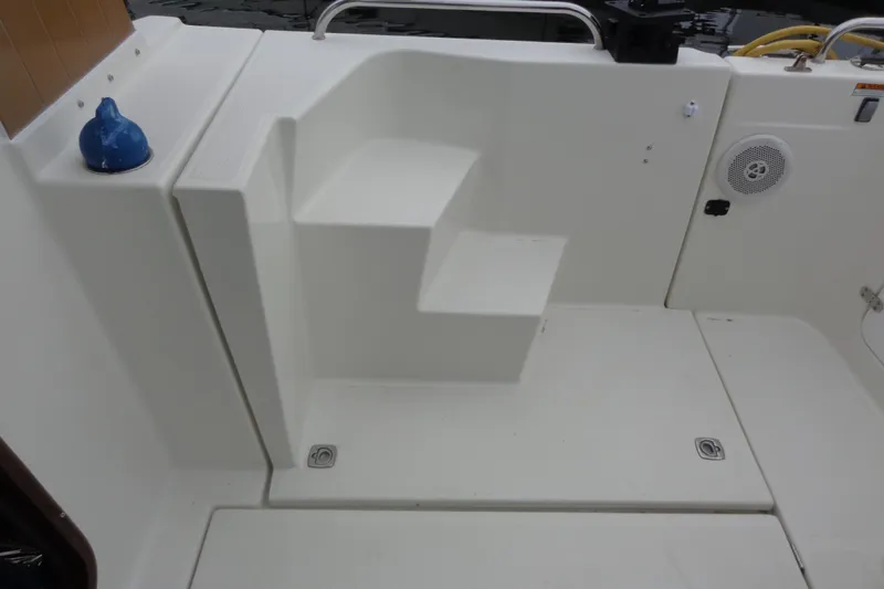 Tugs-n-kisses And Triple Axle Trailer Yacht Photos Pics 2011 Ranger Tugs R-29 Classic boat interior with steps and speaker.