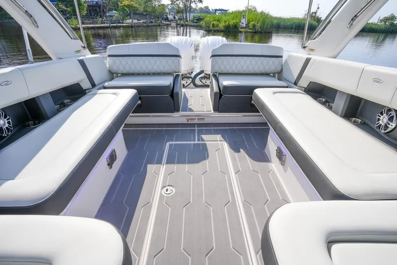  Yacht Photos Pics 2023 Regal 29 OBX boat interior with spacious seating and modern design.