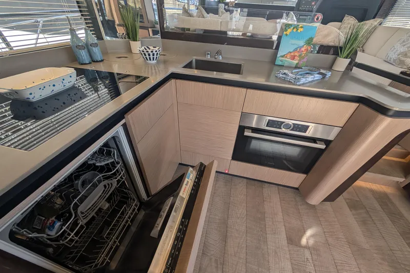 In Stock Yacht Photos Pics Modern kitchen in 2025 Absolute Navetta 53 yacht with dishwasher and oven.
