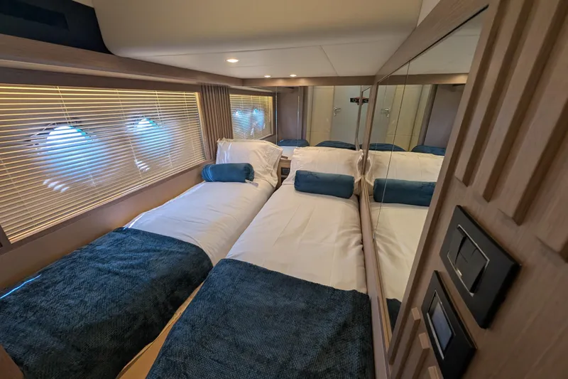 In Stock Yacht Photos Pics Luxurious twin cabin interior of 2025 Absolute Navetta 53 yacht with modern design.