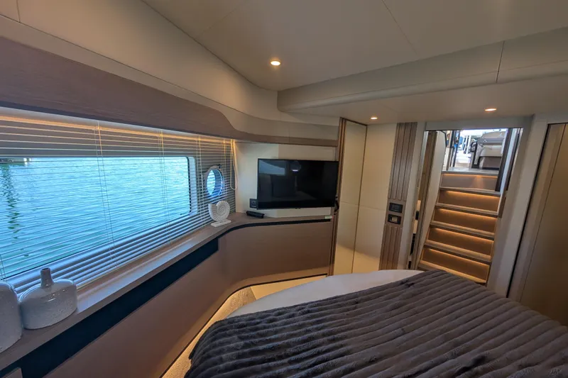In Stock Yacht Photos Pics Luxurious interior of 2025 Absolute Navetta 53 yacht with modern design and cozy ambiance.