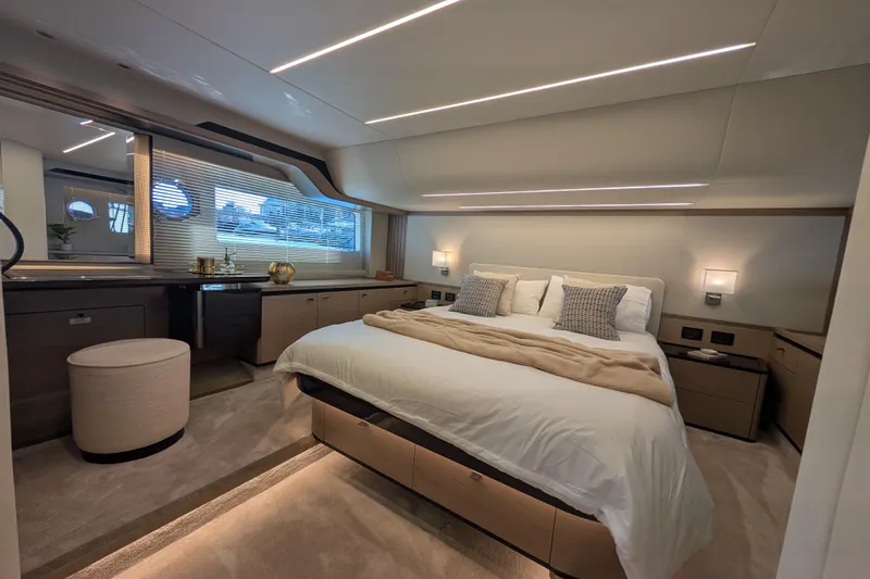 In Stock Yacht Photos Pics Luxurious bedroom interior of 2025 Absolute Navetta 53 yacht, featuring modern design and elegant furnishings.
