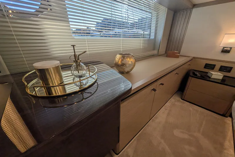 In Stock Yacht Photos Pics Luxurious interior of 2025 Absolute Navetta 53 yacht with elegant decor and modern furnishings.