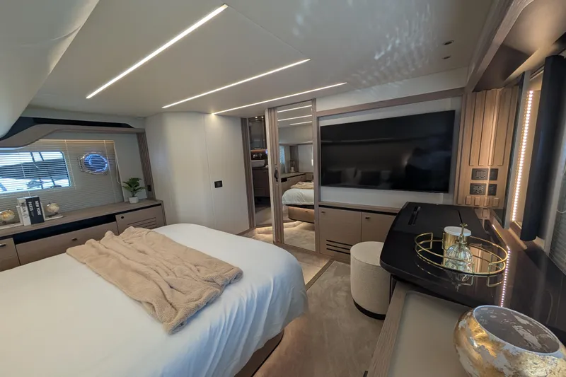 In Stock Yacht Photos Pics Luxurious bedroom interior of 2025 Absolute Navetta 53 yacht with modern decor and amenities.