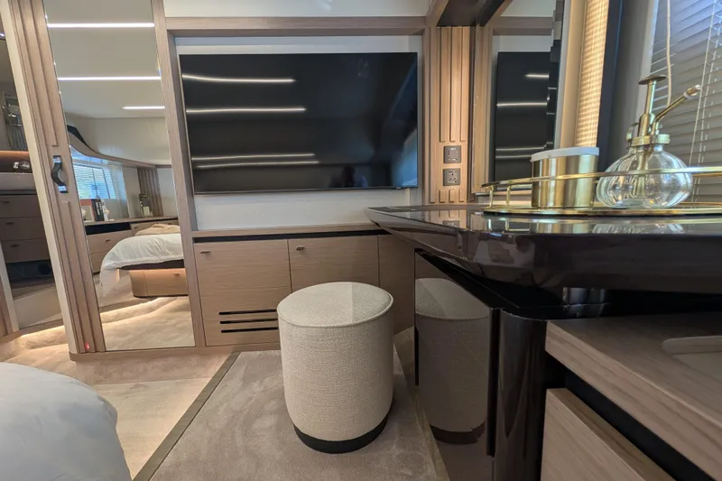 In Stock Yacht Photos Pics Luxurious interior of 2025 Absolute Navetta 53 yacht with modern furnishings and elegant decor.