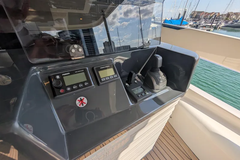 In Stock Yacht Photos Pics Control panel of 2025 Absolute Navetta 53 yacht with navigation instruments.