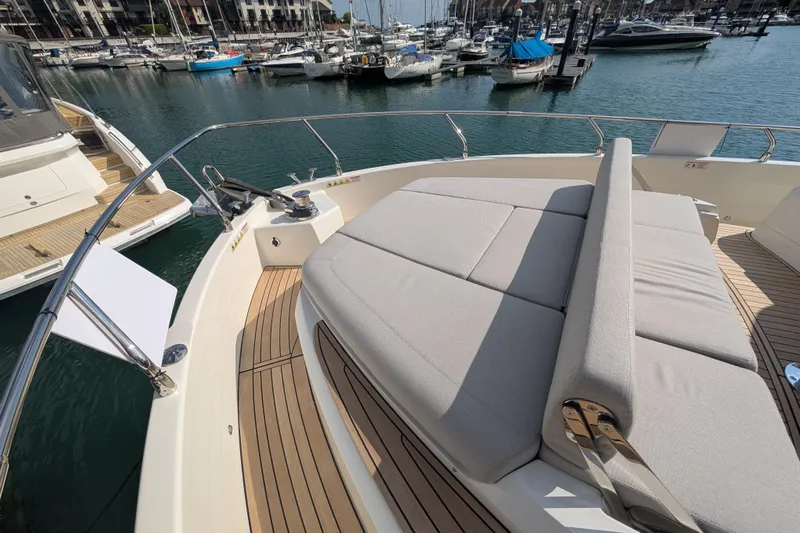 In Stock Yacht Photos Pics Luxurious 2025 Absolute Navetta 53 yacht with spacious deck and comfortable seating.