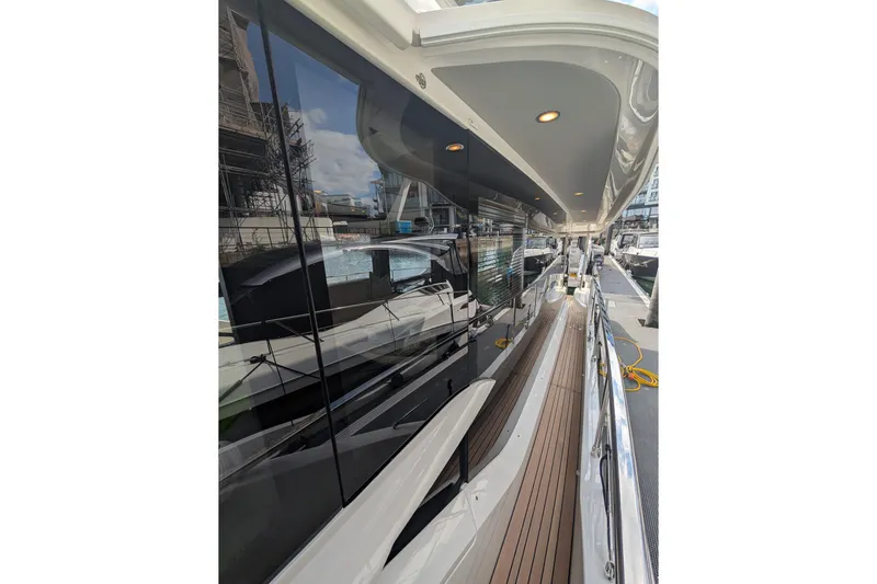 In Stock Yacht Photos Pics 2025 Absolute Navetta 53 yacht with sleek design and modern deck features.