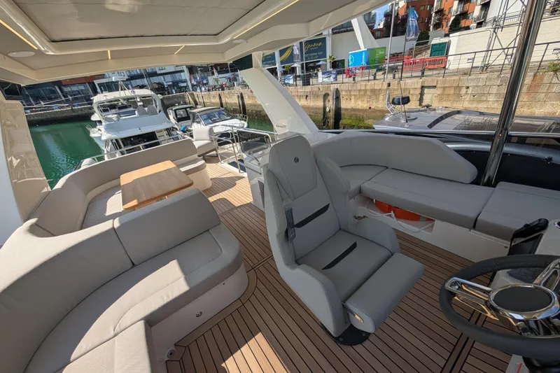 In Stock Yacht Photos Pics Luxurious 2025 Absolute Navetta 53 yacht interior with elegant seating and modern design.