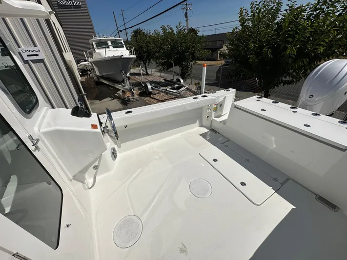  Yacht Photos Pics 2026 Parker 2220 boat deck with clean, spacious layout and modern design.