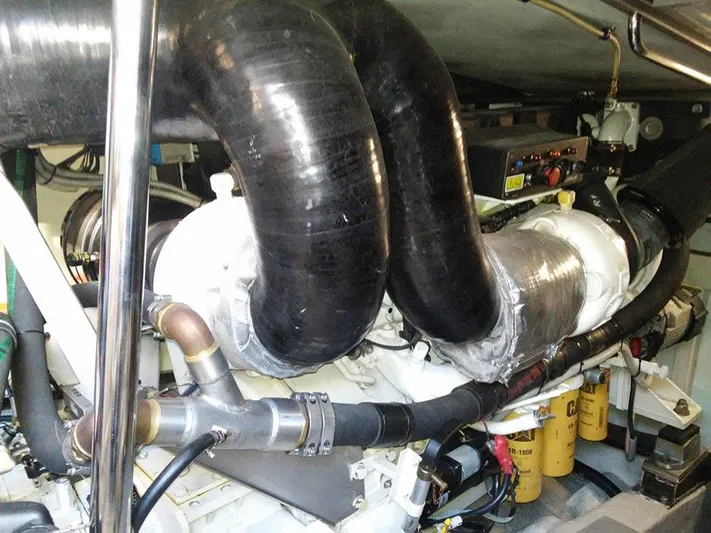  Yacht Photos Pics Engine room of 2009 Azimut 62 Evolution yacht, featuring complex piping and machinery.