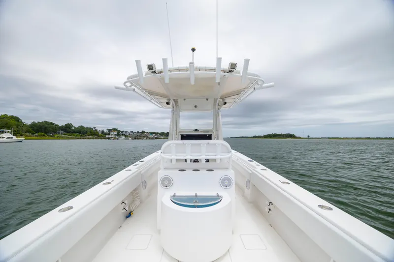  Yacht Photos Pics Contender 30 Tournament 2012 boat on calm water under cloudy sky.