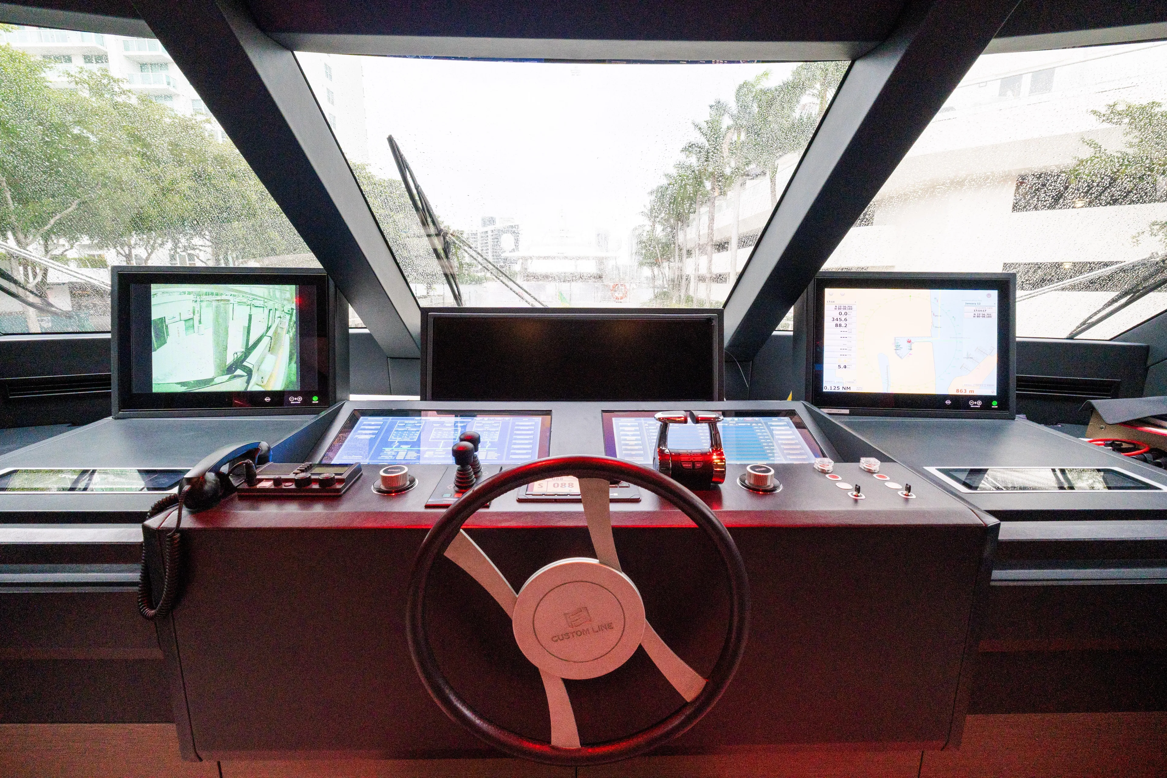 Amity Yacht Photos Pics Cockpit of 2018 Custom Line Navetta 33 yacht with advanced navigation controls.