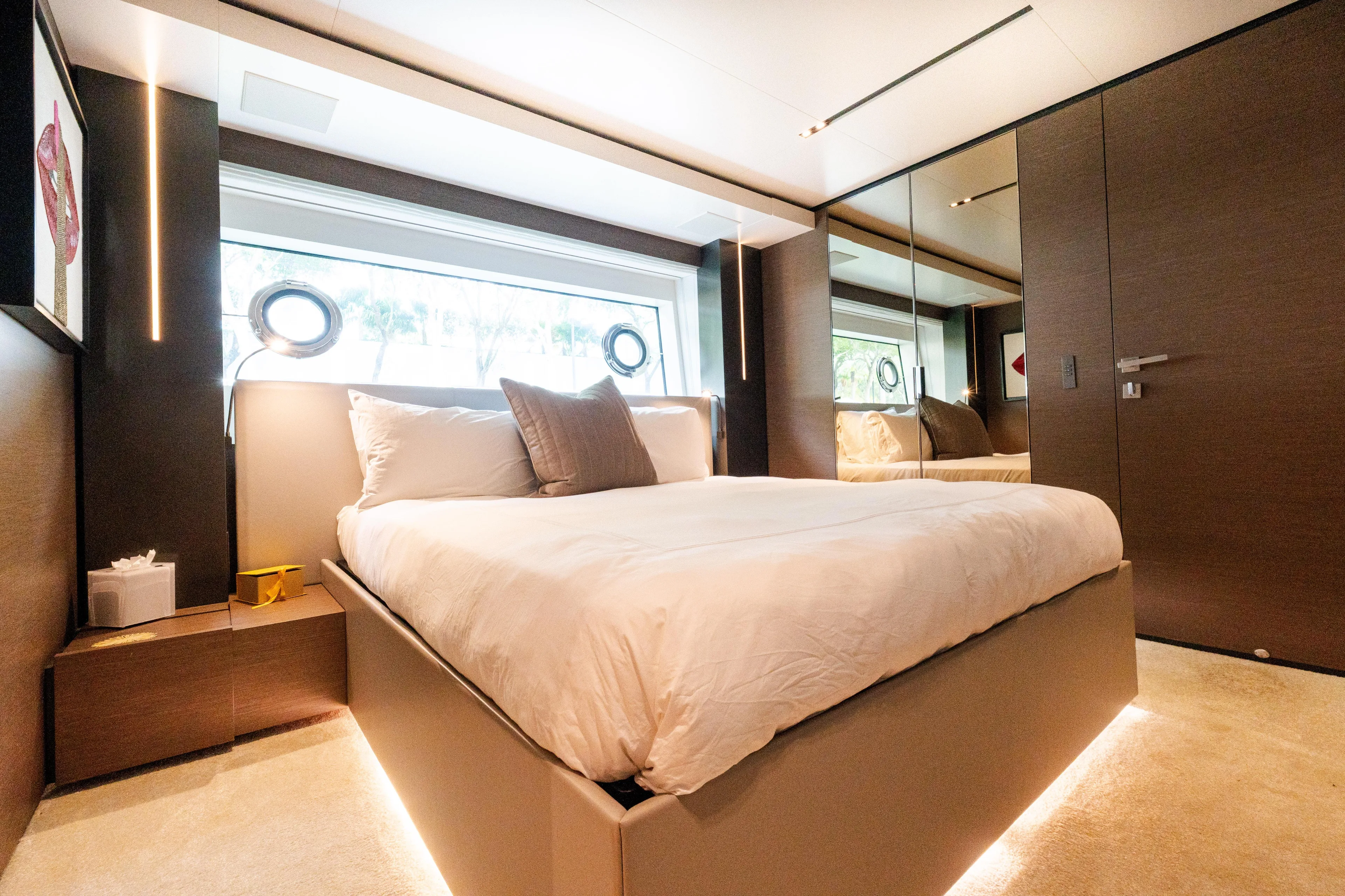 Amity Yacht Photos Pics Luxurious bedroom interior of 2018 Custom Line Navetta 33 yacht with modern design elements.