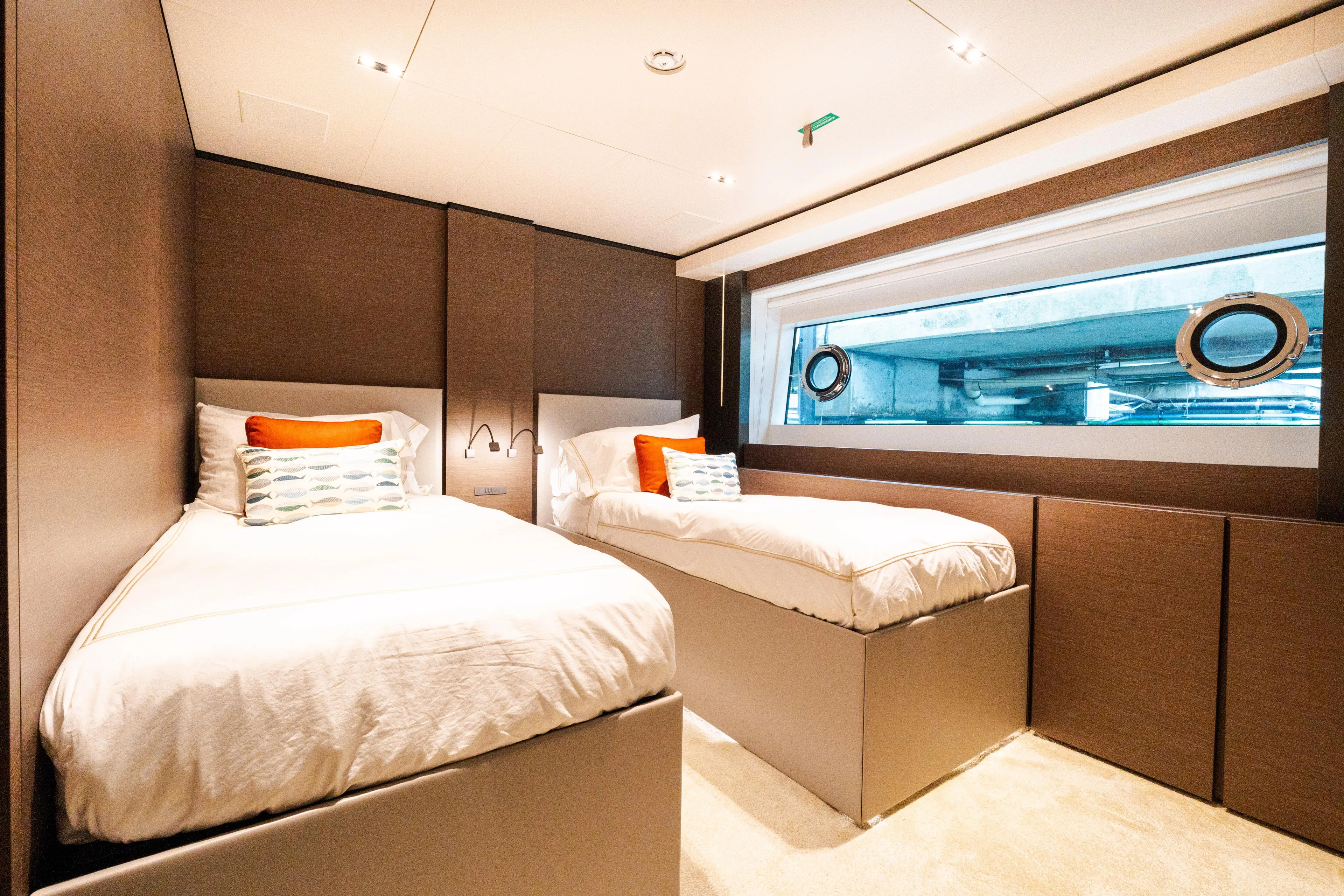 Amity Yacht Photos Pics Luxurious twin bedroom on 2018 Custom Line Navetta 33 yacht with modern decor.