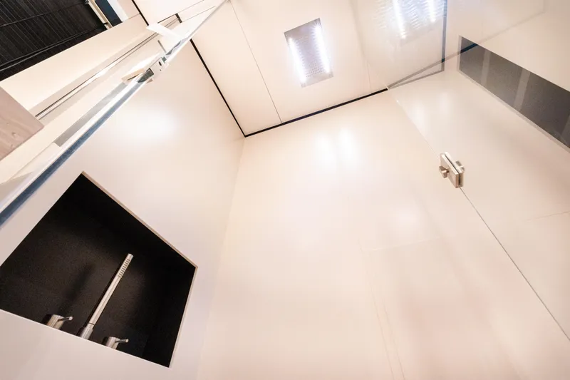 Amity Yacht Photos Pics Modern shower interior on 2018 Custom Line Navetta 33 yacht, featuring sleek design and fixtures.