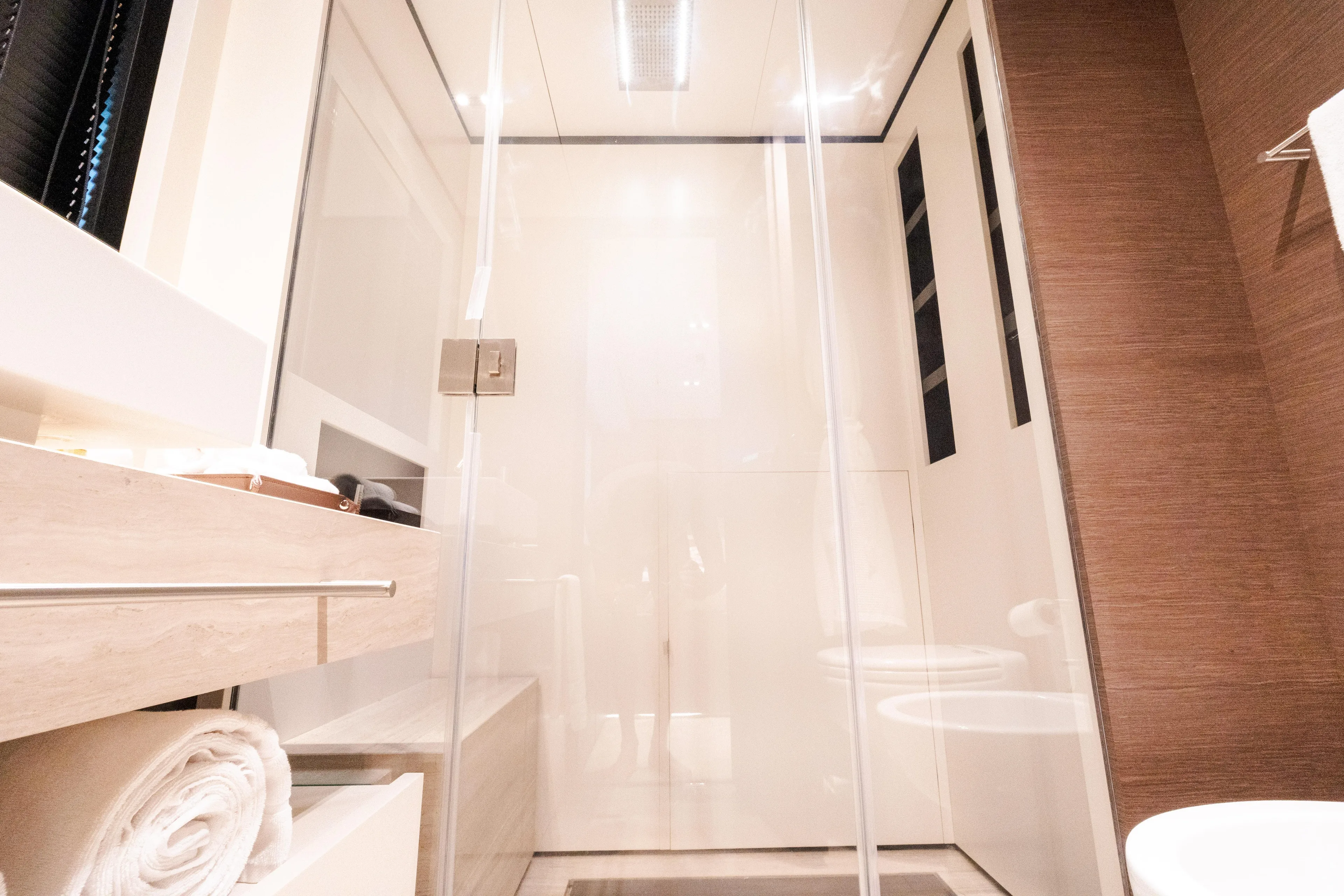 Amity Yacht Photos Pics Luxurious bathroom interior on 2018 Custom Line Navetta 33 yacht, featuring modern design elements.