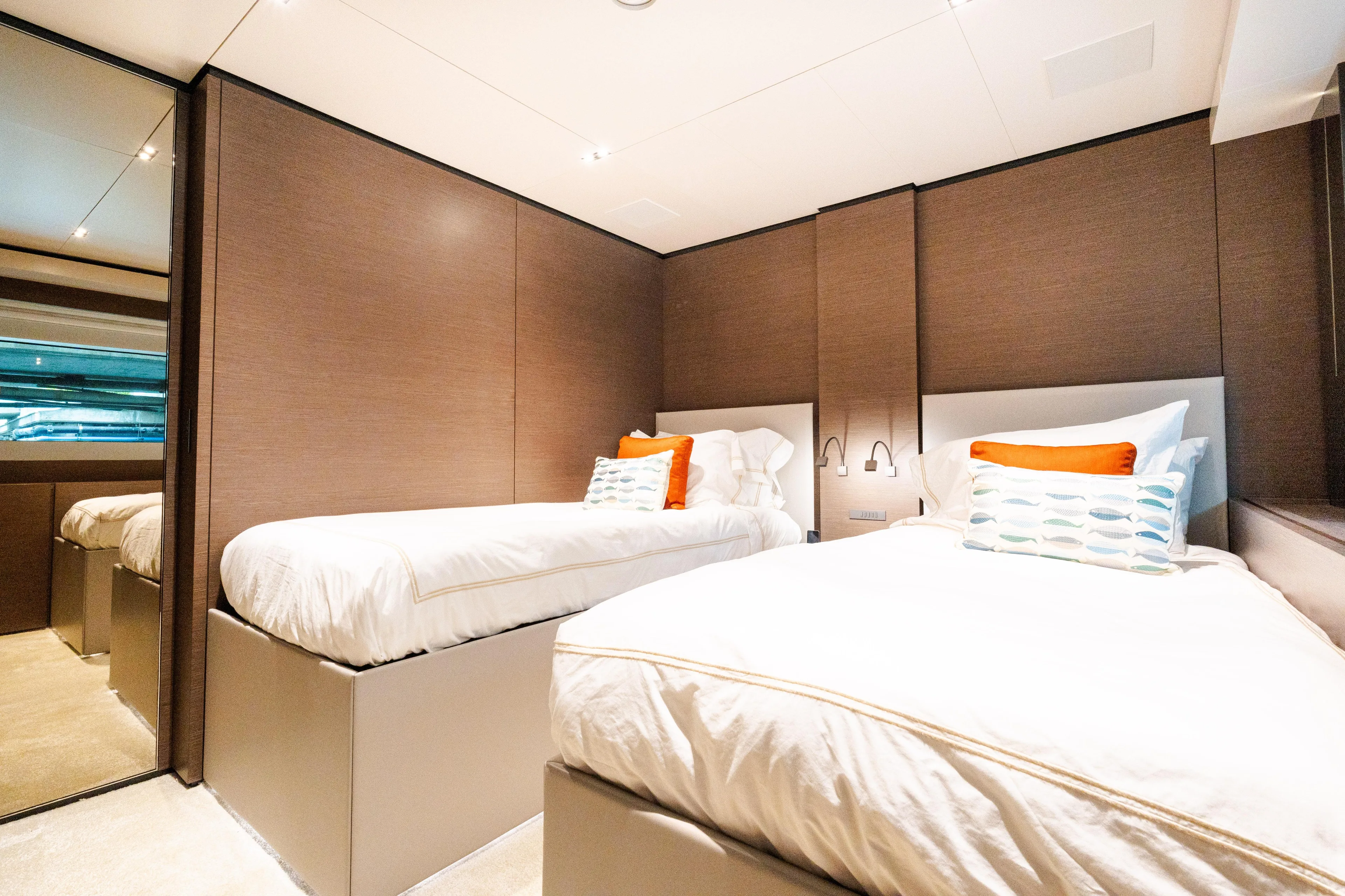 Amity Yacht Photos Pics Luxurious twin bedroom on 2018 Custom Line Navetta 33 yacht, featuring modern design and cozy decor.