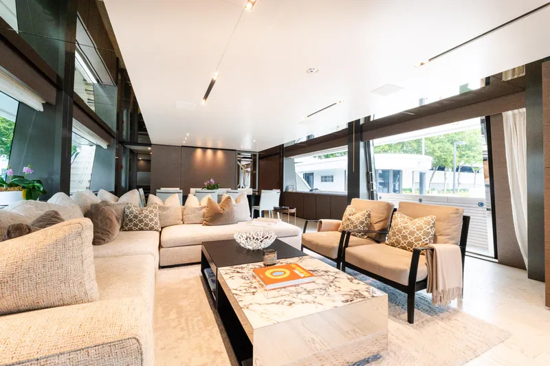 Amity Yacht Photos Pics Luxurious interior of 2018 Custom Line Navetta 33 yacht with elegant seating and modern decor.