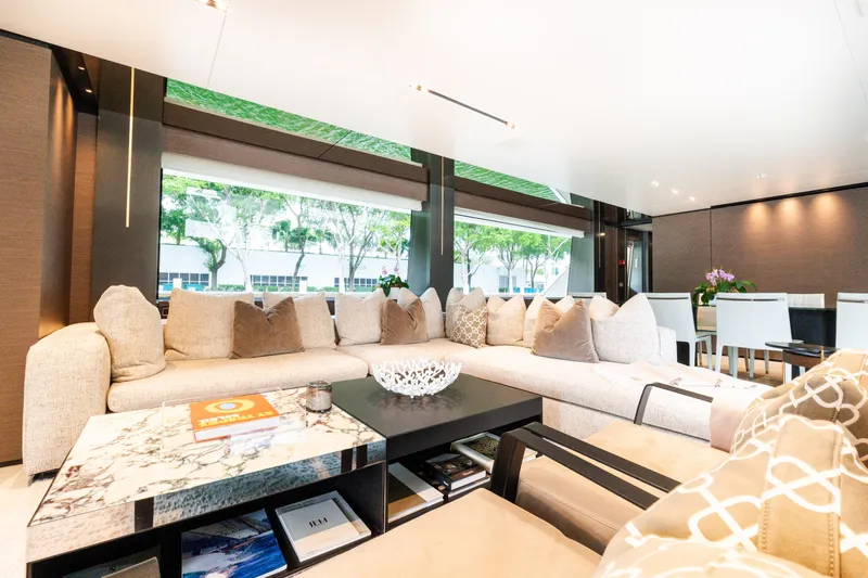 Amity Yacht Photos Pics Luxurious interior of 2018 Custom Line Navetta 33 yacht with elegant seating and decor.