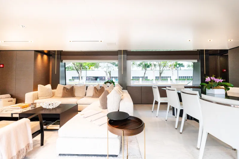 Amity Yacht Photos Pics Luxurious interior of 2018 Custom Line Navetta 33 yacht with elegant seating and dining area.