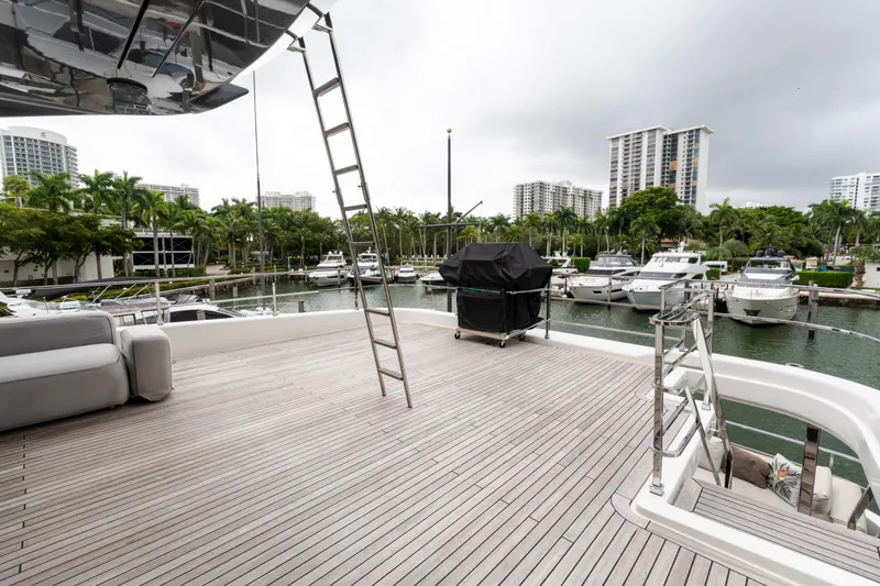 Amity Yacht Photos Pics Spacious deck of 2018 Custom Line Navetta 33 yacht in marina setting.