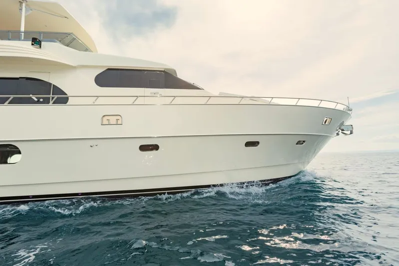 Alegre Yacht Photos Pics Luxury 2004 Symbol M.S Super 88 Motoryacht cruising on open sea.